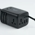 Baseus EnerCore CG11 universal travel adapter with retractable USB-C cable.